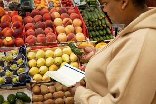 Woman Buying Groceries in a Store in Hamilton